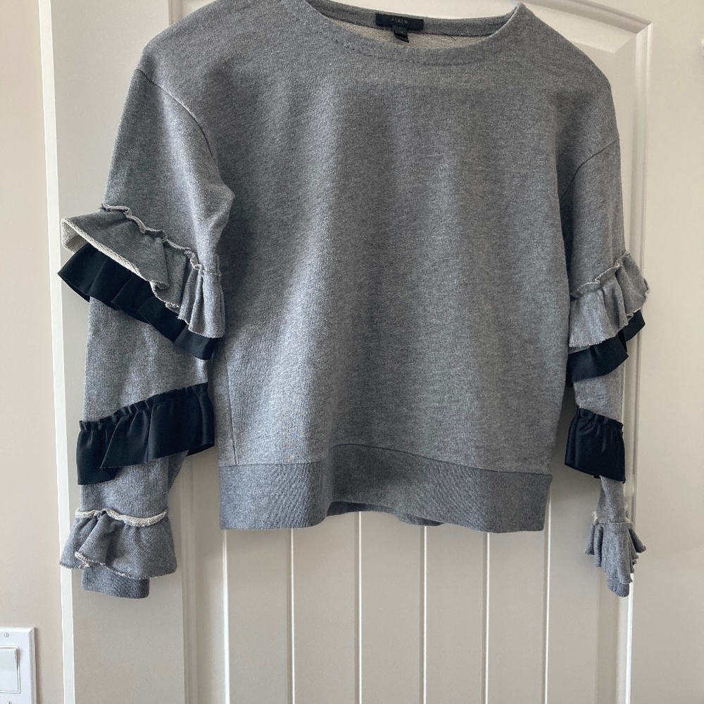 Very pretty JCrew grey / frills on arms, slight crop sweatshirt size XS.